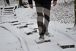 Tactile path for bare feet awakens the senses and uneven endings on the feet alternating different materials wood stone gravel san