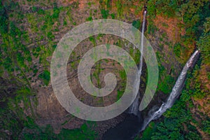 Tad Fan waterfall in The deep forest in Southern of Laos