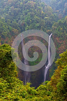 Tad Fan waterfall in The deep forest in Southern of Laos