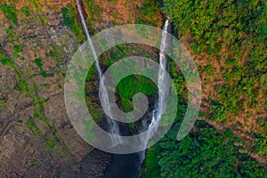 Tad Fan waterfall in The deep forest in Southern of Laos