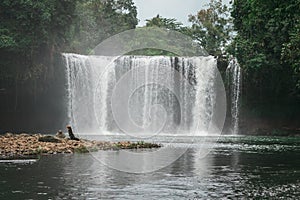 Tad Thum Jum Pee Waterfall in Paksong District