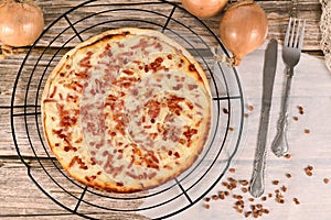 Taditional food `Tarte Flambee` or `Flammkuchen` from German-French Alsace border regiones,