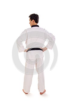 Tae-kwon-do champion pose, back shot portrait