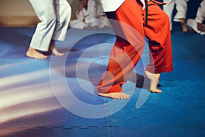 Taekwondo athletes bare feet martial arts movement on floor