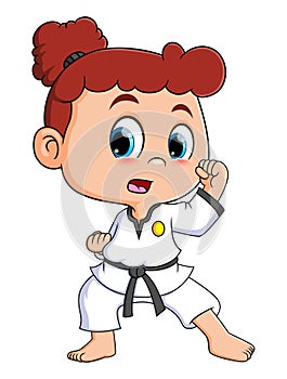 The taekwondo girl is doing the movement for attack the opponent