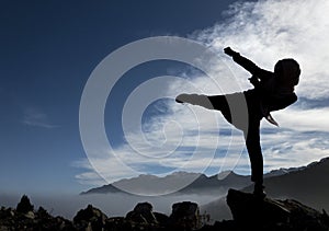 Taekwondo movements and sportive training in nature