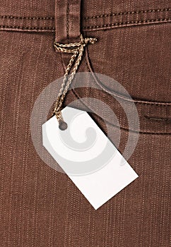 Tag on brown jeans