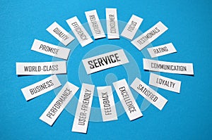 SERVICE paper tag cloud on blue background