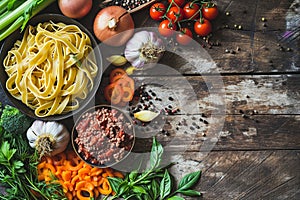 Tagliatelle al RagÃ¹ alla Bolognese Ingredients on Aged Wood photo