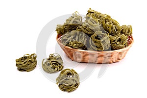 Tagliatelle paglia e fieno at basket photo