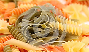 Tagliatelle paglia e fieno and different pastas. photo