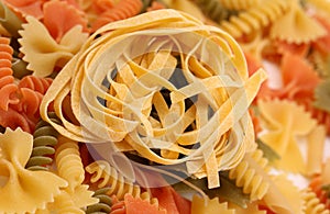 Tagliatelle paglia e fieno and different pastas. photo