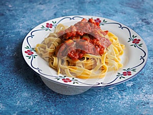 Tagliatelle pasta with chicken tomato sauce