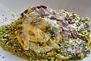 Tagliatelle pasta with pistachio closeup