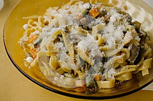 Tagliatelle with vegetable ragu and parmesan - tipical italian f