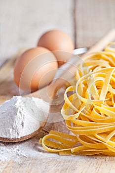 Tagliatelli, flour and eggs photo