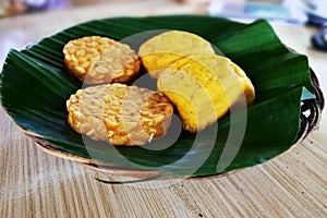 Tahu tempe served on a banana leaf