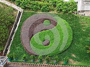 Tai Chi Symbol in garden, wong tai sin temple photo