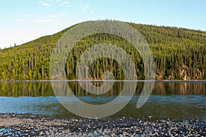 Taiga hills at Steward River near town of Mayo photo