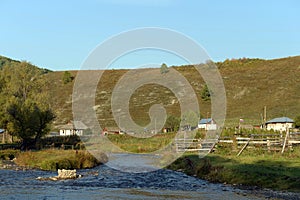 The Taiga village of Generalka in the mountains of the Altai Territory