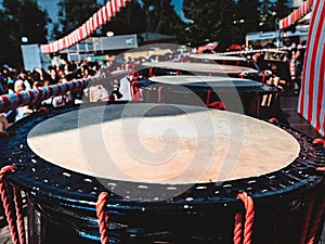 Taiko drums o-kedo on scene people on background. Musical instrument of Asia