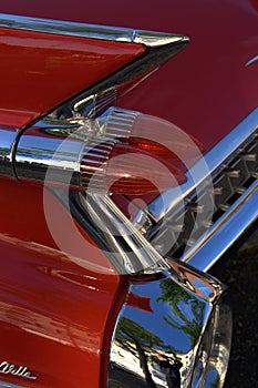 Tail fin of a red vintage car