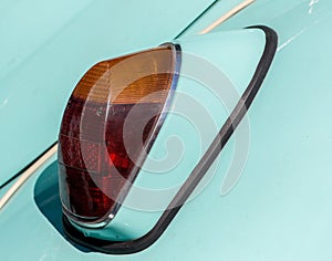 The tail light of a vintage retro car.