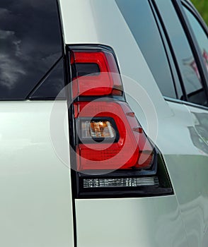 The tail lights on a luxury SUV