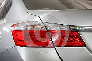 Tail lights ot sedan car