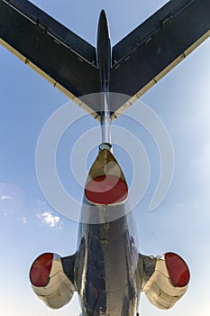 Tail of an old russian airplane on a summer day