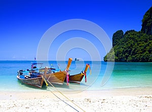 tailboats by the shore at Hong Island, Thailand