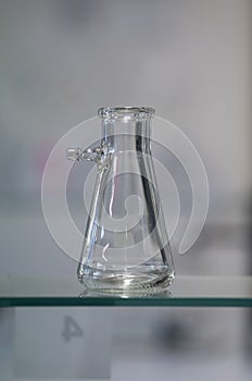 Tailed flask isolated into chemistry laboratory