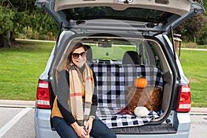 Tailgate picnic on roadtrip in autumn