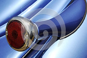 Taillight on blue automobile