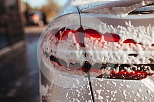 taillight in soapy foam.