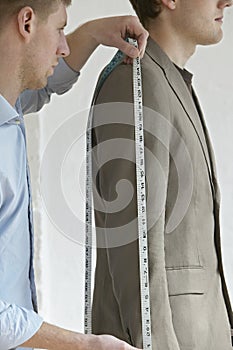 Krejčí měření zákazníci oblek 