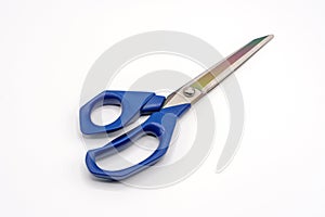 Tailor`s scissors for sewing on a white background