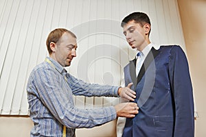 Tailor suit fitting