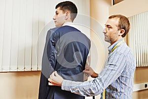 Tailor suit fitting