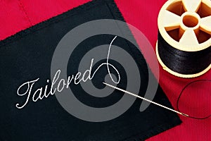 Tailored label on red silk lining photo