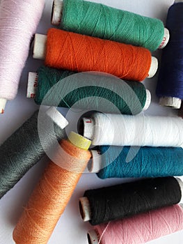 Tailoring matirial mullti color polyester thread rolls photo