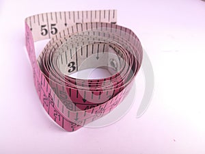 A Tailoring meter tape placed isolated