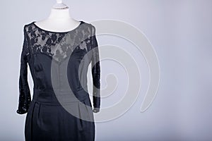 Tailors Mannequin dressed in a Black Dress with Lace