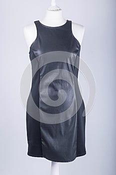 Tailors Mannequin dressed in a Black Leather Dress