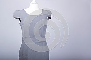 Tailors Mannequin dressed in a Grey Fitted Work Dress