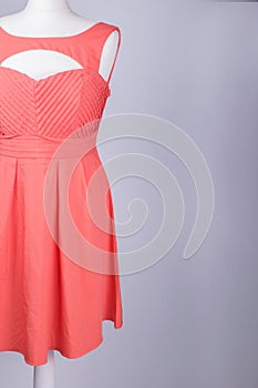 Tailors Mannequin dressed in a Pink Dress with Strappy Back photo