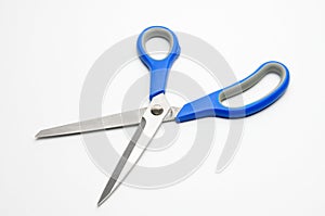 Tailors scissors on a white background