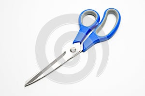 Tailors scissors on a white background