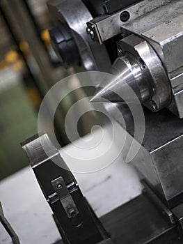 The tailstock of a lathe. Processing of parts. Manufacturing equipment