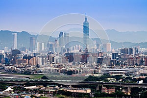 Taipei city cityscape skyline and modern skyscraper architecture in misty sky pollution haze, in Taipei city, Taiwan